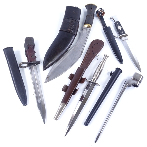 288 - A group of knives and bayonets, comprising a Wilkinson Commando knife with metal scabbard, a No. 7 b... 