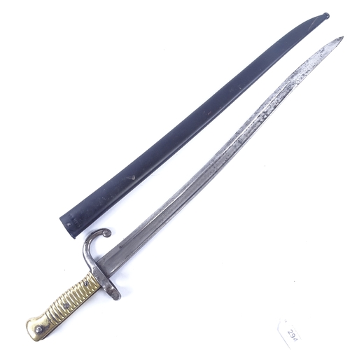 294 - A 19th century French brass-hilted sword bayonet with metal scabbard