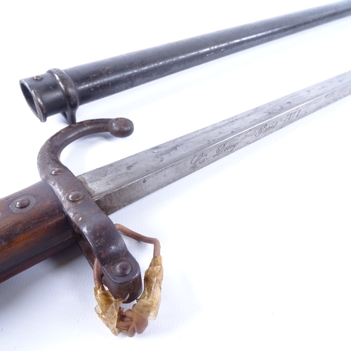 295 - A 19th century French sword bayonet, inscribed L Deny Paris 1878, original metal scabbard