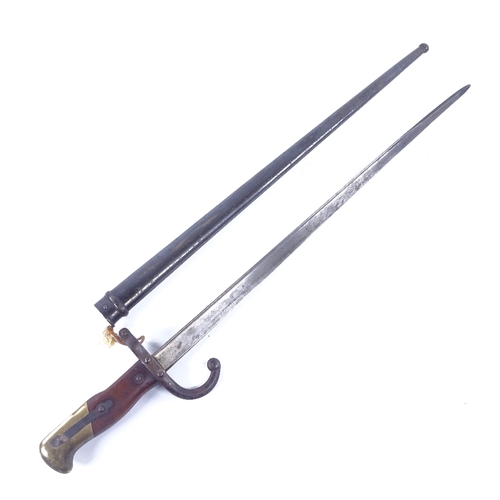 295 - A 19th century French sword bayonet, inscribed L Deny Paris 1878, original metal scabbard