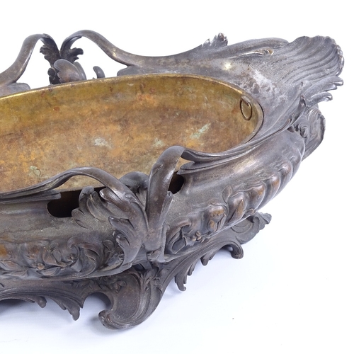 298 - A French patinated bronze table centre jardiniere, by H Luppens & Co of Brussels, circa 1900, with a... 