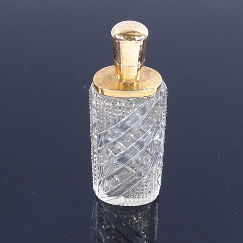 207 - 19th century cut-glass perfume bottle with gold hinged top, height 8.5cm, in original leather case