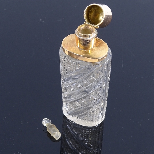 207 - 19th century cut-glass perfume bottle with gold hinged top, height 8.5cm, in original leather case