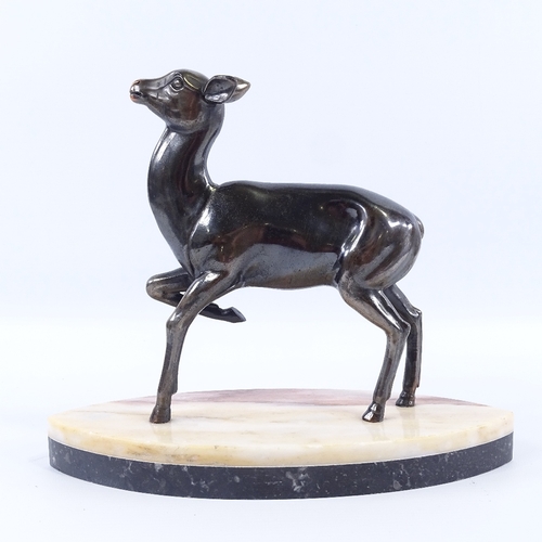 213 - A French bronze patinated spelter sculpture of a fawn, circa 1950s, unsigned, on a 2-colour marble n... 