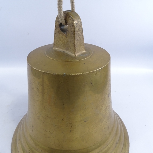 231 - A large polished bronze bell, probably mid-20th century, no impress marks, overall height 28cm, diam... 