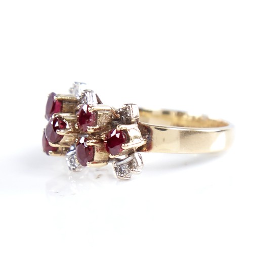 1318 - A late 20th century unmarked gold pigeon blood ruby and diamond cluster cocktail ring, set with oval... 