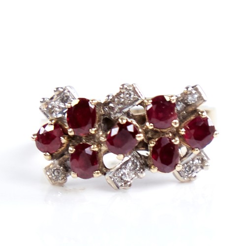 1318 - A late 20th century unmarked gold pigeon blood ruby and diamond cluster cocktail ring, set with oval... 