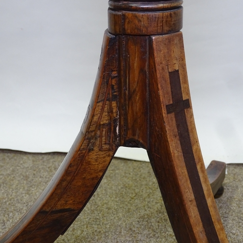 302 - A Regency rosewood and satinwood crossbanded telescopic table, with reeded centre column on tripod b... 