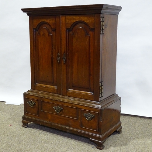 310 - A Georgian mahogany collector's cabinet of small size, with 2 fielded arch panelled doors enclosing ... 