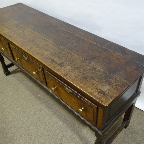 369 - An 18th century oak 3-drawer dresser base, length 170cm, height 82cm, depth 53cm