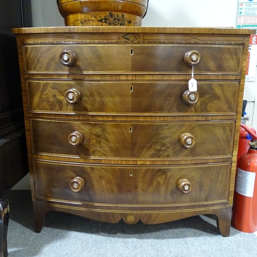 375 - A Regency mahogany and rosewood crossbanded bow-front chest of 4 long drawers, with mother-of-pearl ... 