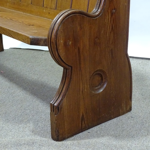 376 - A Victorian pitch pine Gothic church pew of small size, length 140cm