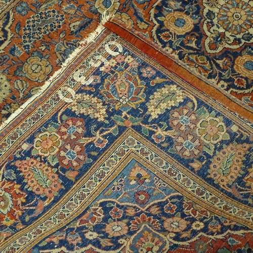 380 - An intricate antique red ground Persian rug, 200 x 135cm.