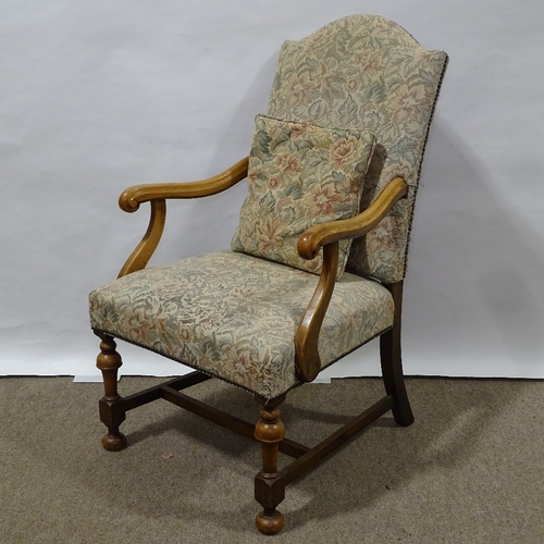 393 - A Victorian beech-framed Carolean style armchair