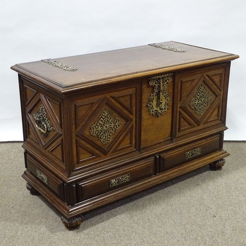 395 - A padouk wood coffer with ornate brass mouldings and mounts, and 2 drawers below, length 102cm, heig... 