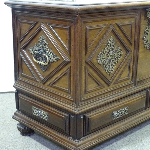 395 - A padouk wood coffer with ornate brass mouldings and mounts, and 2 drawers below, length 102cm, heig... 