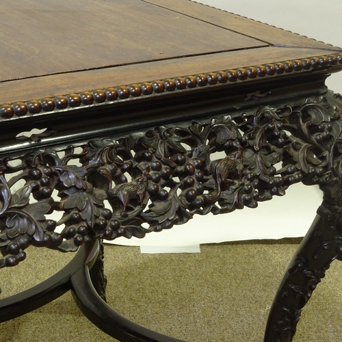 81 - A 19th century Chinese hardwood square centre table, with beaded edge and relief carved and pierced ... 