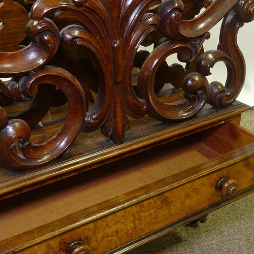 83 - A Victorian walnut Canterbury, carved and pierced acanthus divisions with single drawer below, 51cm ... 