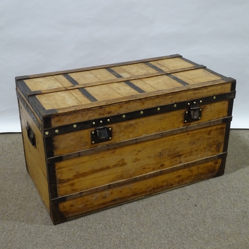 85 - LOUIS VUITTON - Vintage wood and metal-bound travelling trunk, metal carrying handles, original pape... 