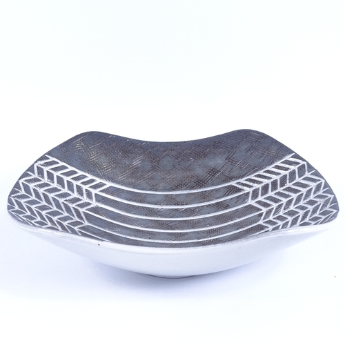 2004 - MARI SIMMULSON FOR URSULA EKEBY, a cut side bowl with incised web decoration, makers marks to base, ... 