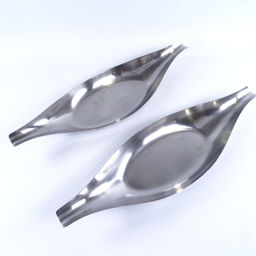 2009 - TINTINHULL, Stainless Steel fruit bowls circa 1970s', in stylised elongated form, length 50cm.