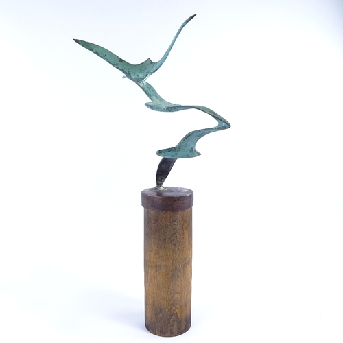 2010 - GUY PORTELLI (British b.1957), bronze of a seagull in flight, on hardwood plinth, signed on bronze b... 