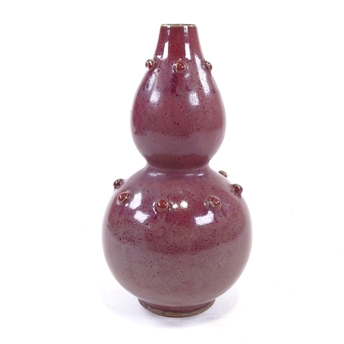 190 - A Chinese red glaze porcelain double-gourd vase, incised marks under base, height 24cm