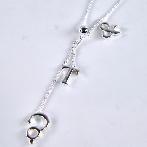 1665 - ELSA PERETTI for TIFFANY & CO - a modern sterling silver T&Co lariat pendant necklace, chain length ... 