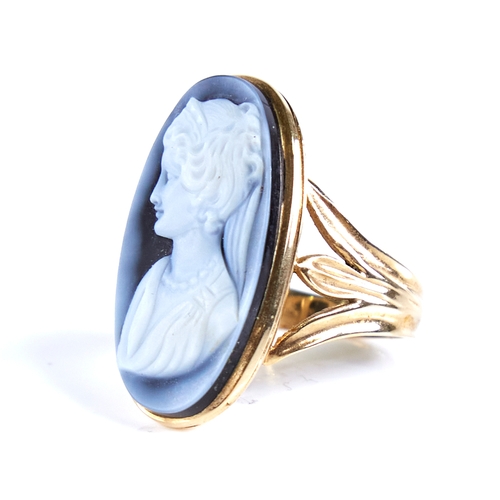 1666 - A large late 20th century 9ct gold relief carved hardstone cameo ring, depicting female profile, hal... 