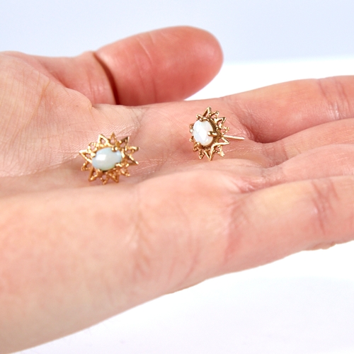 1669 - A pair of late 20th century 9ct gold cabochon opal starburst earrings, earring height 13.9mm, 1.8g