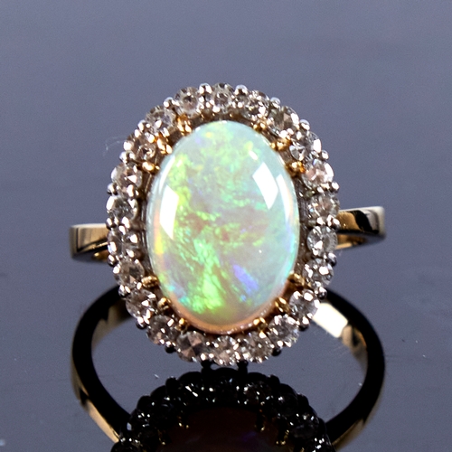 1670 - A large late 20th century 18ct gold cabochon opal and diamond cluster ring, set with oval cabochon o... 