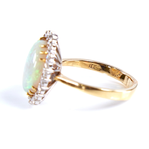 1670 - A large late 20th century 18ct gold cabochon opal and diamond cluster ring, set with oval cabochon o... 