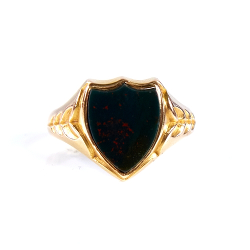 1671 - A large 19th century 15ct gold bloodstone shield seal ring, engraved leaf shoulders, hallmarks Birmi... 