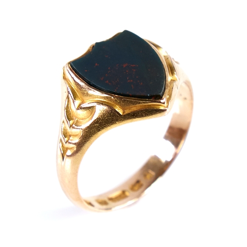 1671 - A large 19th century 15ct gold bloodstone shield seal ring, engraved leaf shoulders, hallmarks Birmi... 