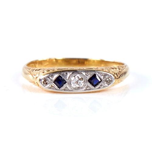 1676 - An early 20th century 18ct gold graduated 5-stone sapphire and diamond half hoop ring, set with roun... 