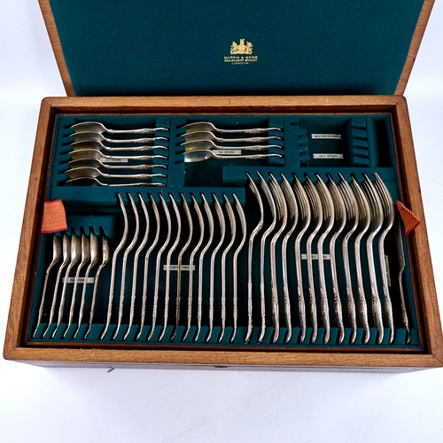 1683 - An Edwardian Mappin & Webb solid silver King's pattern canteen of cutlery for 12 people, comprising ... 