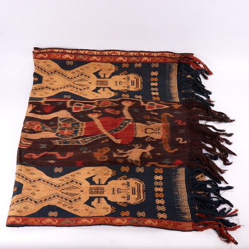 388 - East Timor Tais textile, with figural borders and centre panel, length 240cm x 66cm, together with a... 