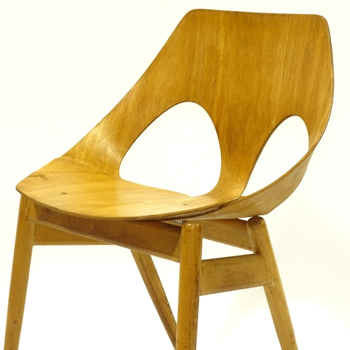 2126 - CARL JACOBS FOR KANDYA, BRITISH, a 1950s' Jason chair in bent plywood, with makers label, height 72c... 