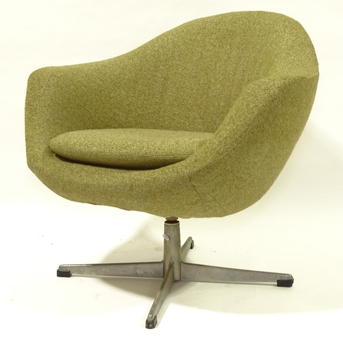 2135 - EERO SAARINEN (1910-61), swivel chair on aluminium star base, height 70cm.