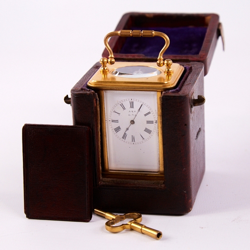 1055 - A 19th century miniature brass-cased carriage clock timepiece, white enamel dial with Roman numeral ... 