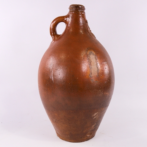 343 - A large salt glaze Bellarmine flagon, height 46cm