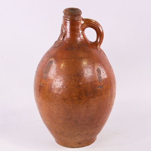 344 - A mid-size salt glaze Bellarmine flagon, height 34cm