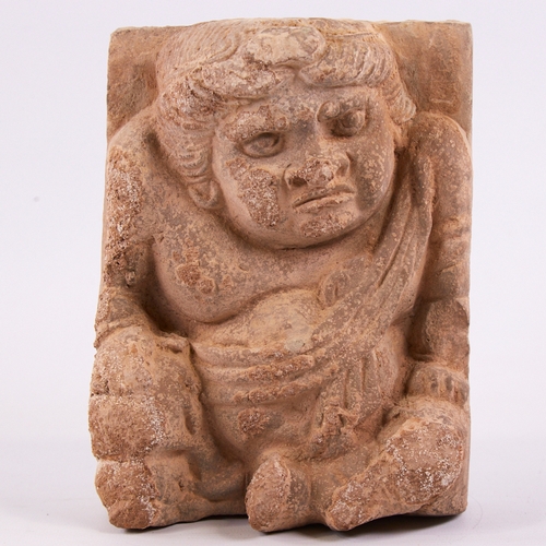 90 - An Antique South American relief carved terracotta or stone plaque depicting a kneeling figure, heig... 
