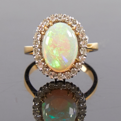 1670 - A large late 20th century 18ct gold cabochon opal and diamond cluster ring, set with oval cabochon o... 