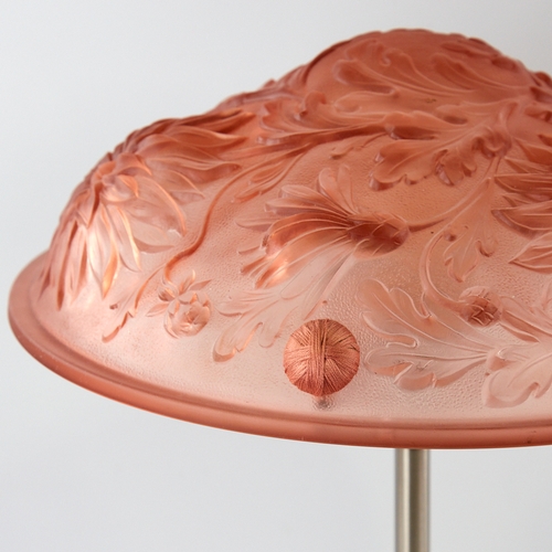 2086 - SCANDI-FRANCAIS LUMIERE ET GLASS, Table lamp with French 1940s' pink glass shade on a steel base, he... 