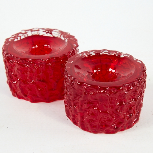 2117 - GEOFFREY BAXTER FOR WHITEFRIARS, a pair of mid century ruby glass candle holders, diameter 8cm.