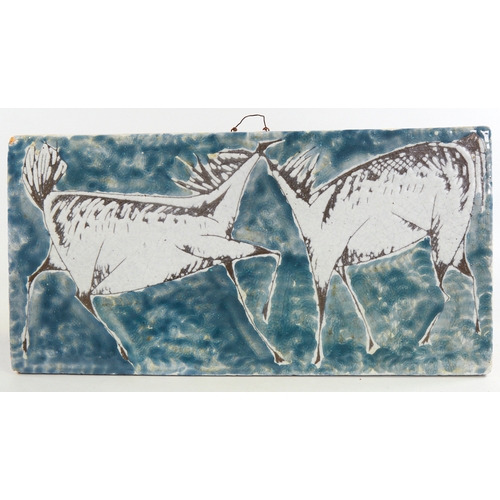 2138 - A Scandinavian mid-century ceramic wall plaque, with abstract horse design, length 49cm.