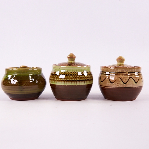 2026 - SIDNEY & CHARLES TUSTIN FOR WINCHCOMBE POTTERY, 3 studio pottery slipware jam pots, maker and potter... 