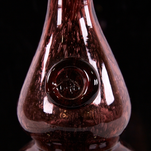 2043 - Mid-Century Amythyst glass decanter, hand blown studio glass with applied plaque, height 35cm.