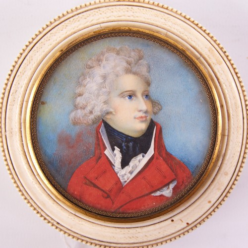 65 - ROYAL INTEREST - an early 19th century circular ivory box, with inset painted portrait on ivory depi... 